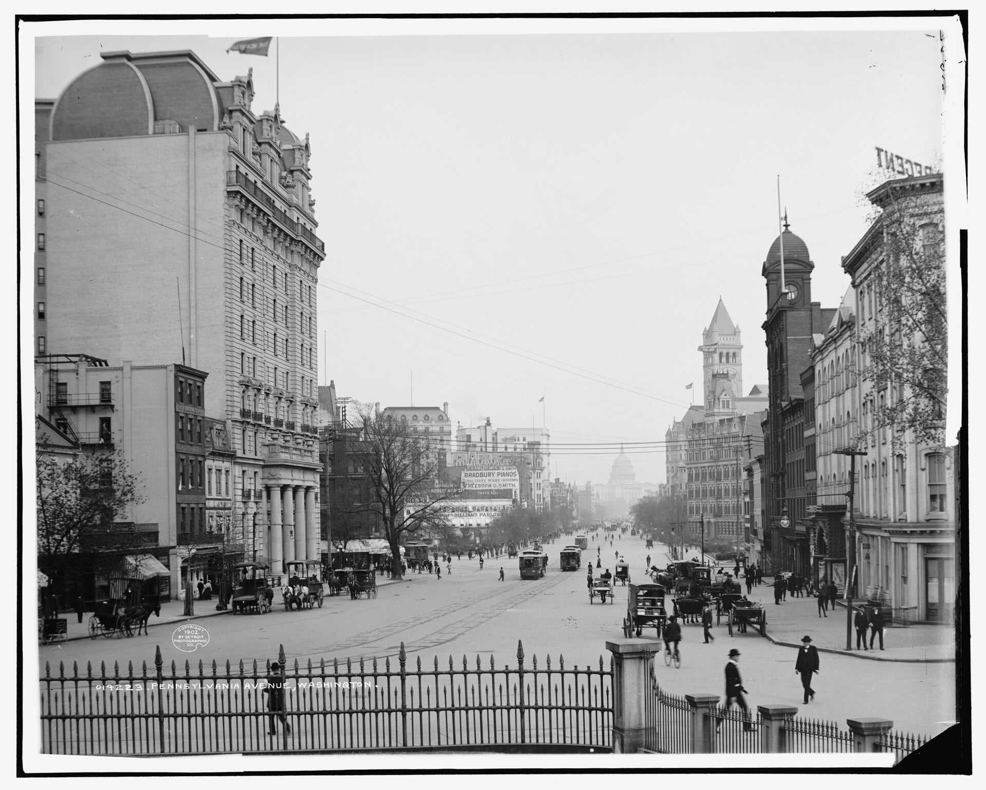 Pennsylvania Avenue with streetcars and horse-drawn carriages, looking toward the Capitol around 1902